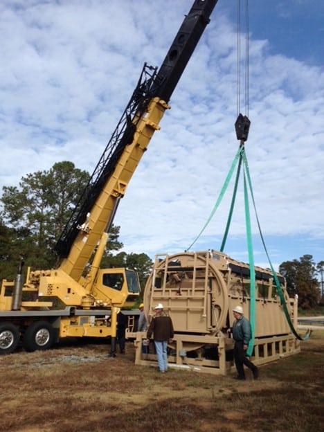 Crane lifting large equipment